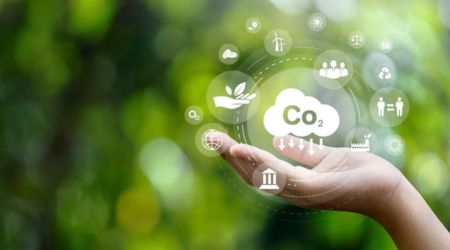 Hand holding CO2 emissions