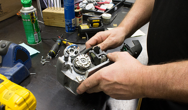 Service tech working on tape head